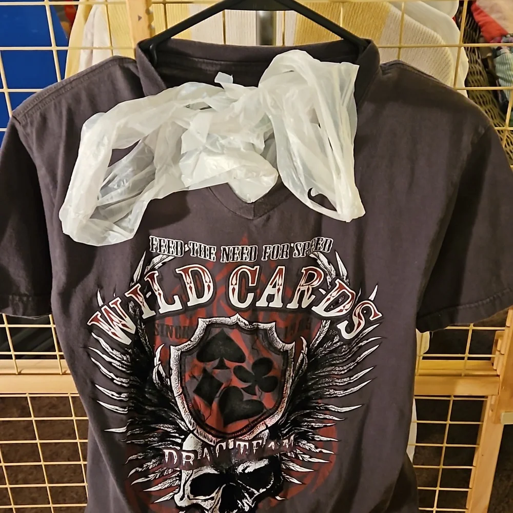 From moms closet This is a shirt sewed up to store plastic bags or anything else